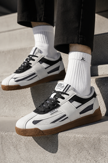 London Heritage Trainers in Black White on concrete steps